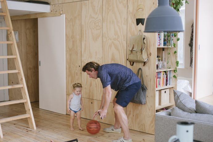 The Flinders Lane Apartment uses full-height joinery to create flexible spaces with an abundance of in-built storage. Photograph by Olga Bennett.