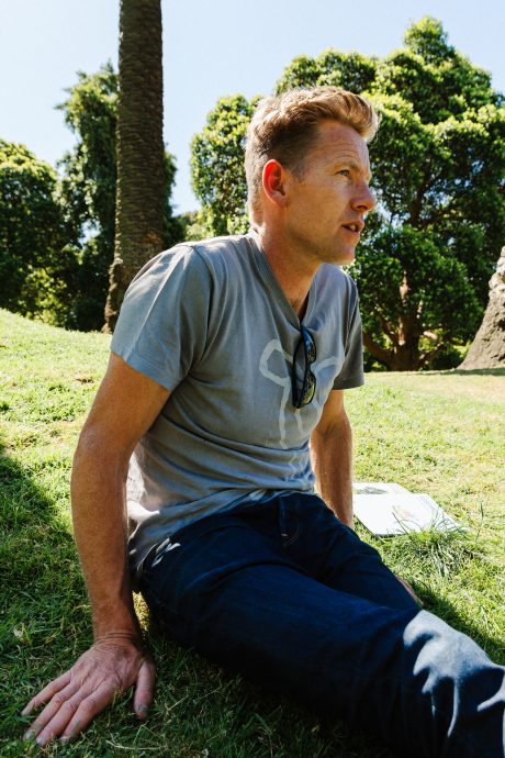 Joost Bakker sitting among the greenery of the Queen Victoria Gardens. Photograph by Ben Clement.
